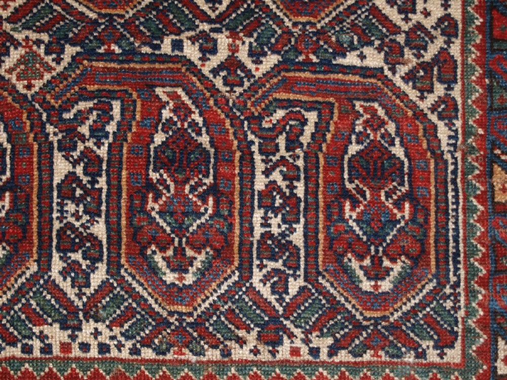 ANTIQUE KHAMSEH RUG WITH REPEAT BOTEH DESIGN, CIRCA 1900. View VIII