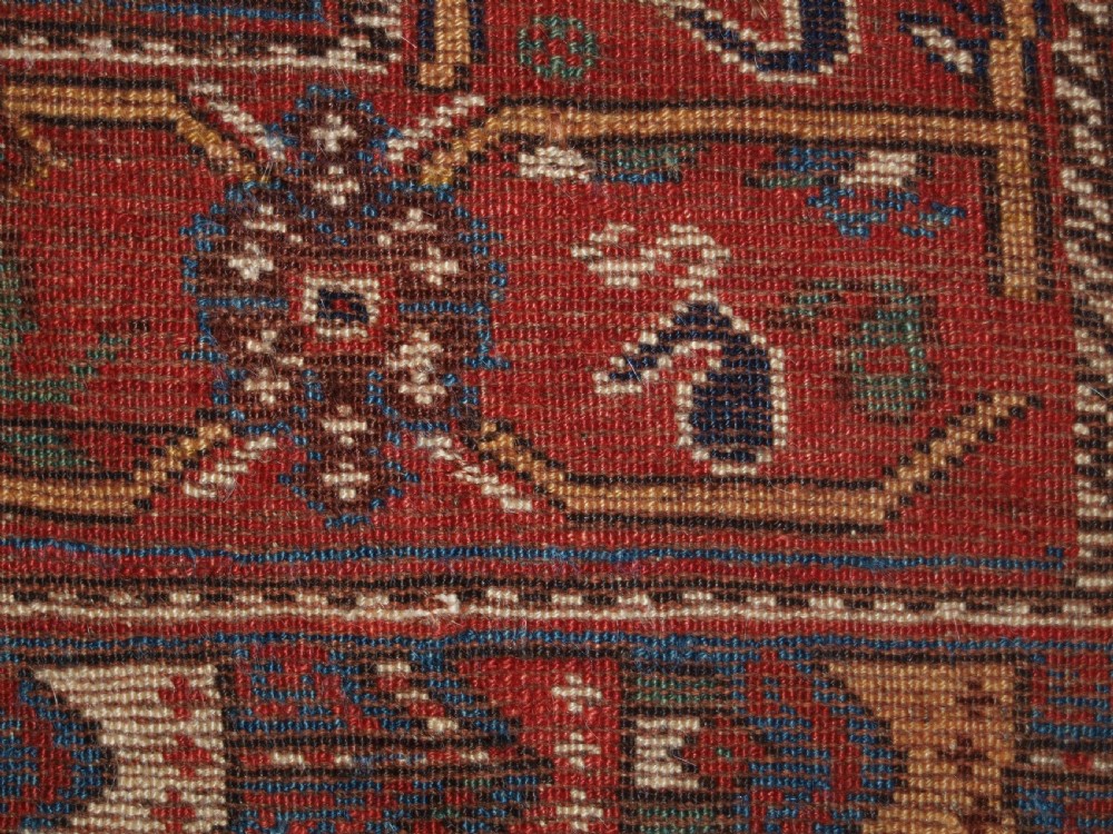 ANTIQUE KHAMSEH RUG WITH REPEAT BOTEH DESIGN, CIRCA 1900. View IX
