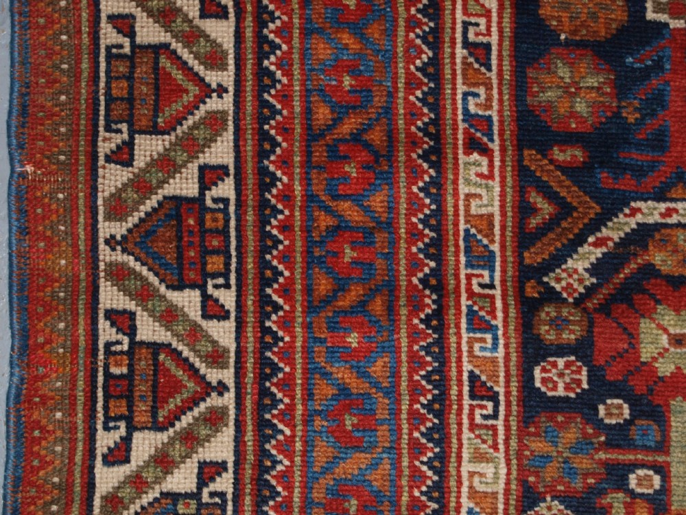 ANTIQUE AFSHAR RUG WITH REPEAT LARGE BOTEH DESIGN, CIRCA 1900/20. View IV