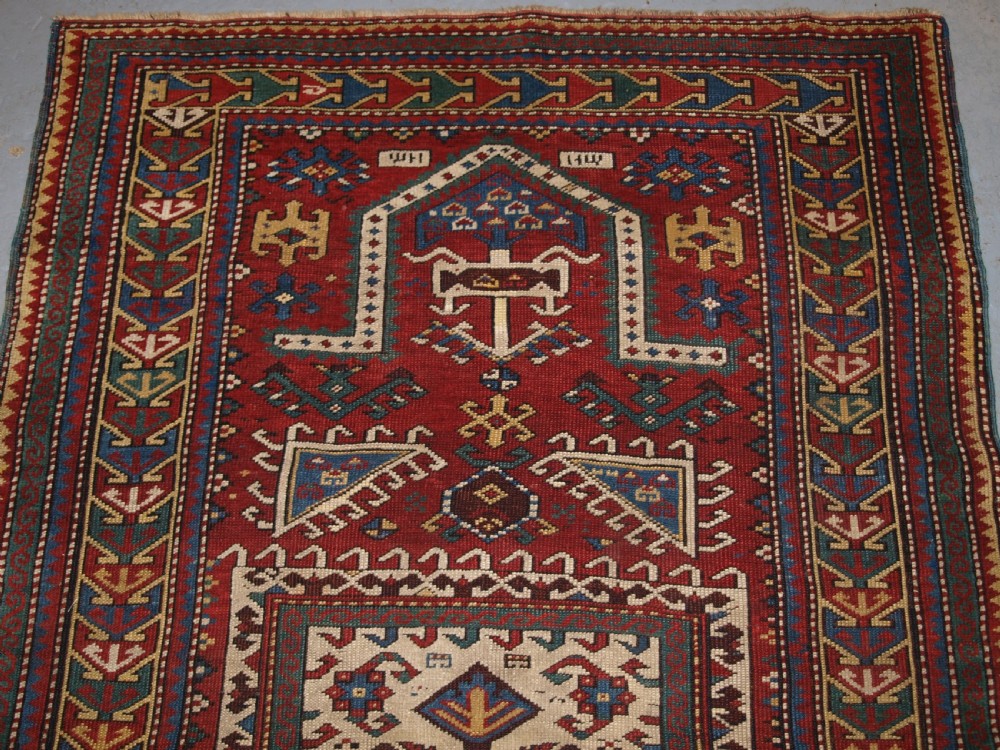 ANTIQUE CAUCASIAN KAZAK PRAYER RUG, PROBABLY FACHRALO, LATE 19TH CENTURY. View IV