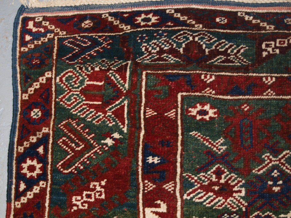 OLD TURKISH DOSEMEALTI VILLAGE RUG WITH UNUSUAL GREEN GROUND, CIRCA 1920. View II