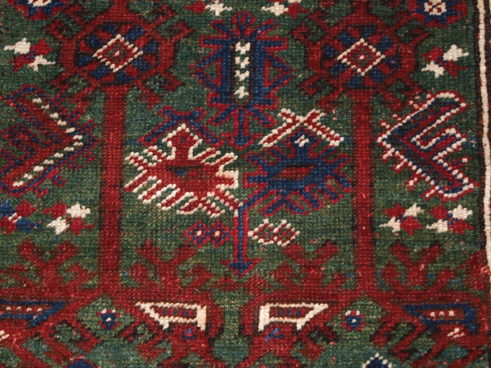 OLD TURKISH DOSEMEALTI VILLAGE RUG WITH UNUSUAL GREEN GROUND, CIRCA 1920. View VII