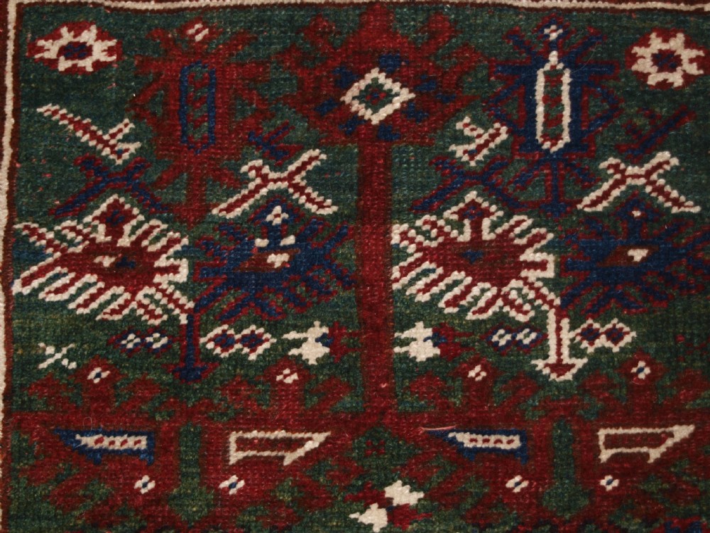 OLD TURKISH DOSEMEALTI VILLAGE RUG WITH UNUSUAL GREEN GROUND, CIRCA 1920. View VIII