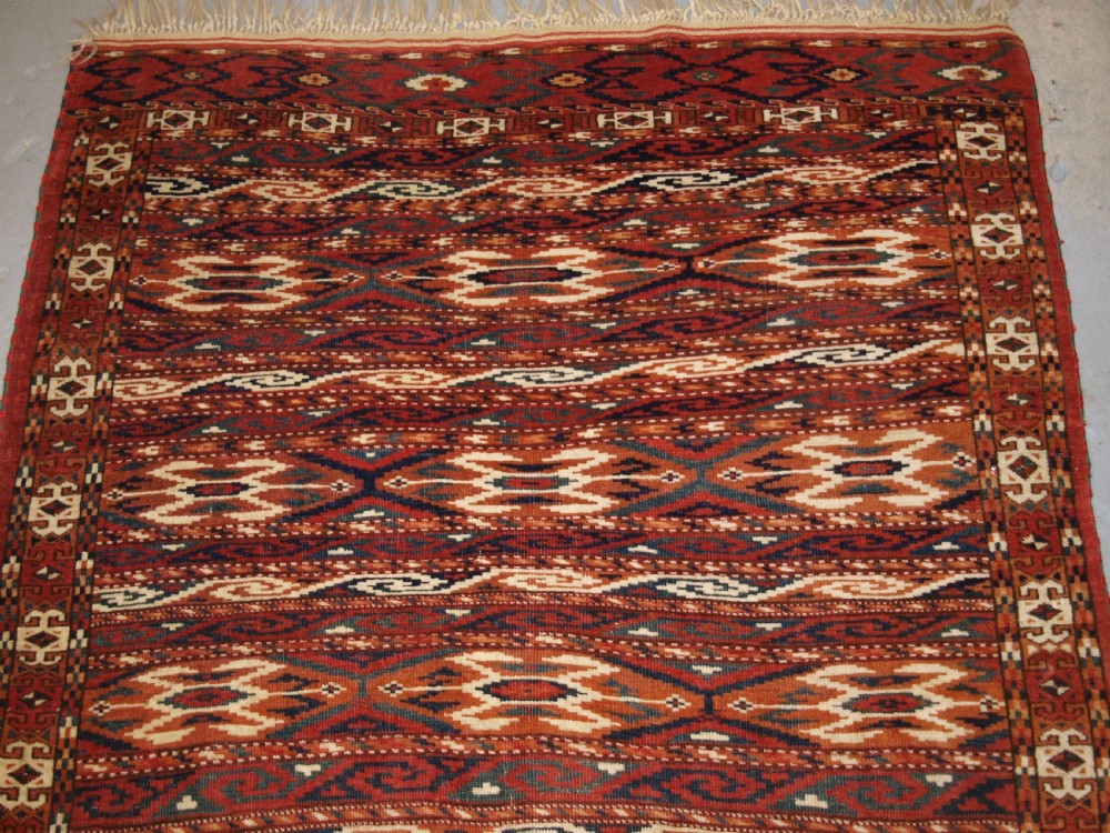 ANTIQUE YOMUT TURKMEN RUG, SCARCE BANDED DESIGN, EXCELLENT COLOUR, LATE 19TH CENTURY. View IV