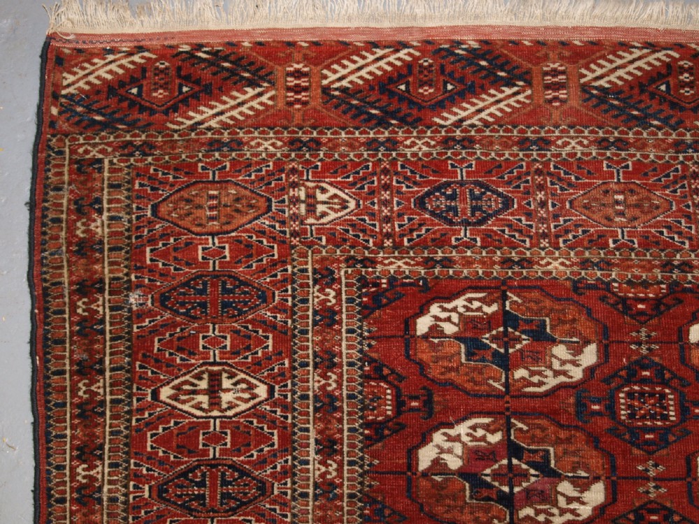 ANTIQUE TEKKE TURKMEN MAIN CARPET, SQUARE SHAPE, GOOD COLOUR, LATE 19TH CENTURY. View III