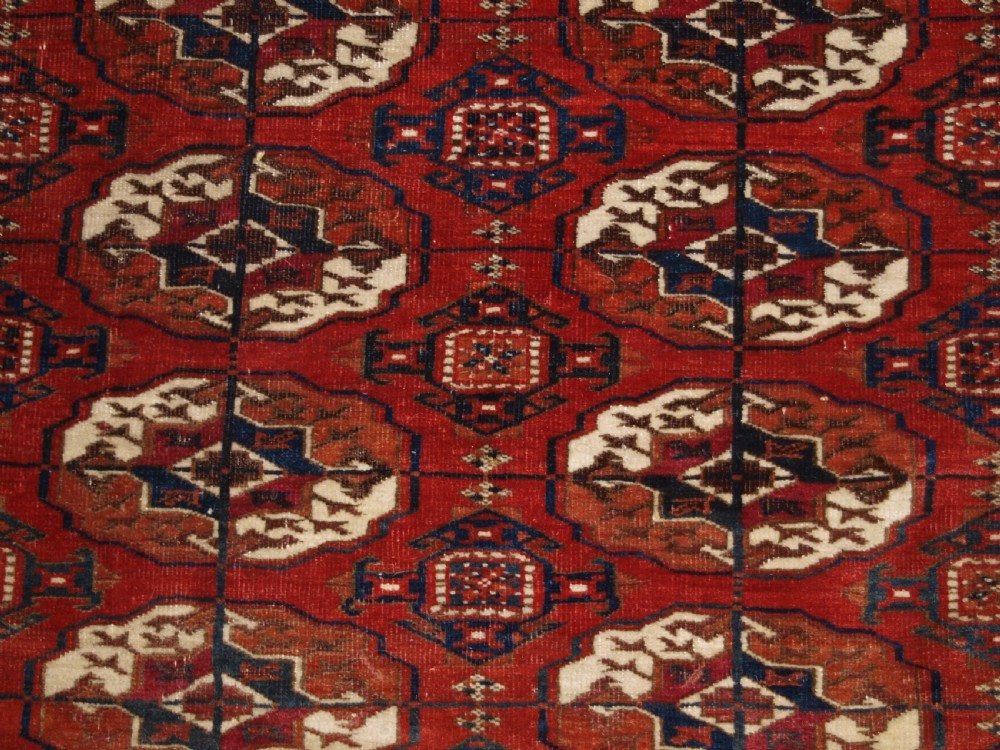 ANTIQUE TEKKE TURKMEN MAIN CARPET, SQUARE SHAPE, GOOD COLOUR, LATE 19TH CENTURY. View X