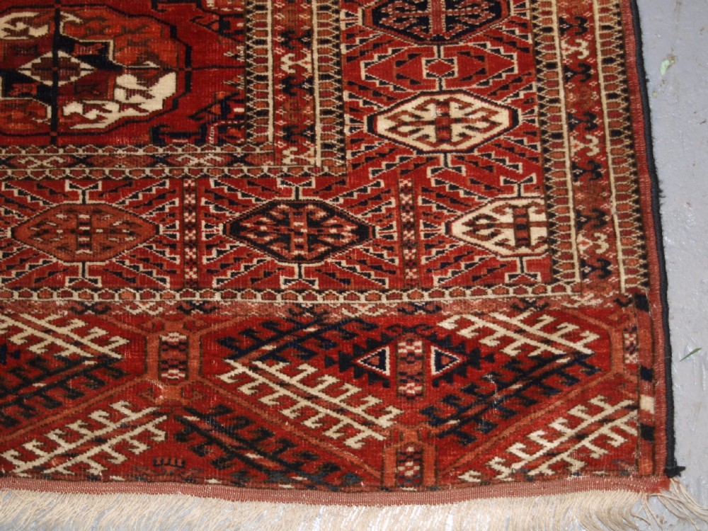 ANTIQUE TEKKE TURKMEN MAIN CARPET, SQUARE SHAPE, GOOD COLOUR, LATE 19TH CENTURY. View XII