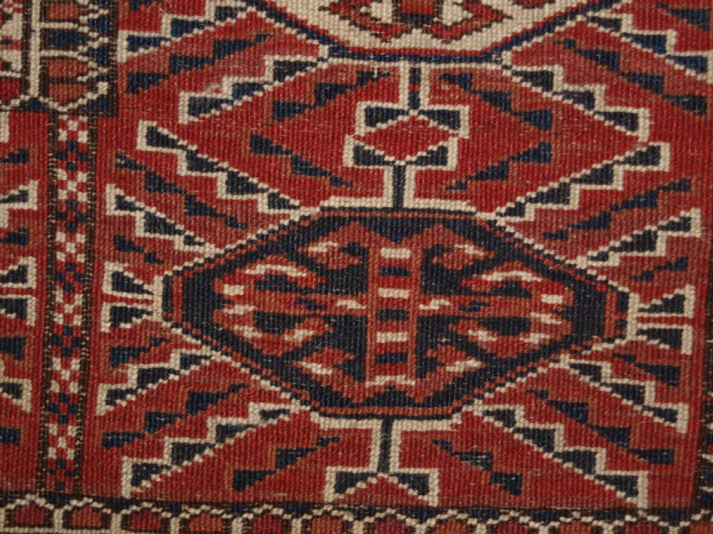 ANTIQUE TEKKE TURKMEN MAIN CARPET, SQUARE SHAPE, GOOD COLOUR, LATE 19TH CENTURY. View XIV