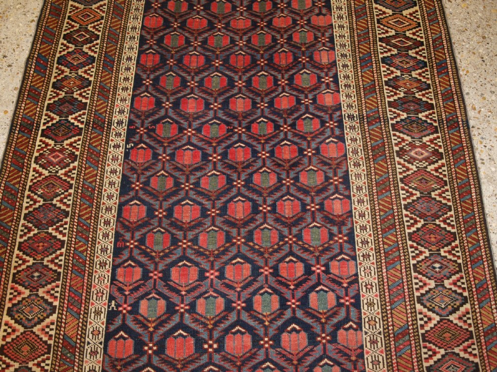 ANTIQUE CAUCASIAN SHIRVAN RUG WITH LATTICE DESIGN FILLED WITH TULIPS, LATE 19TH CENTURY. View V