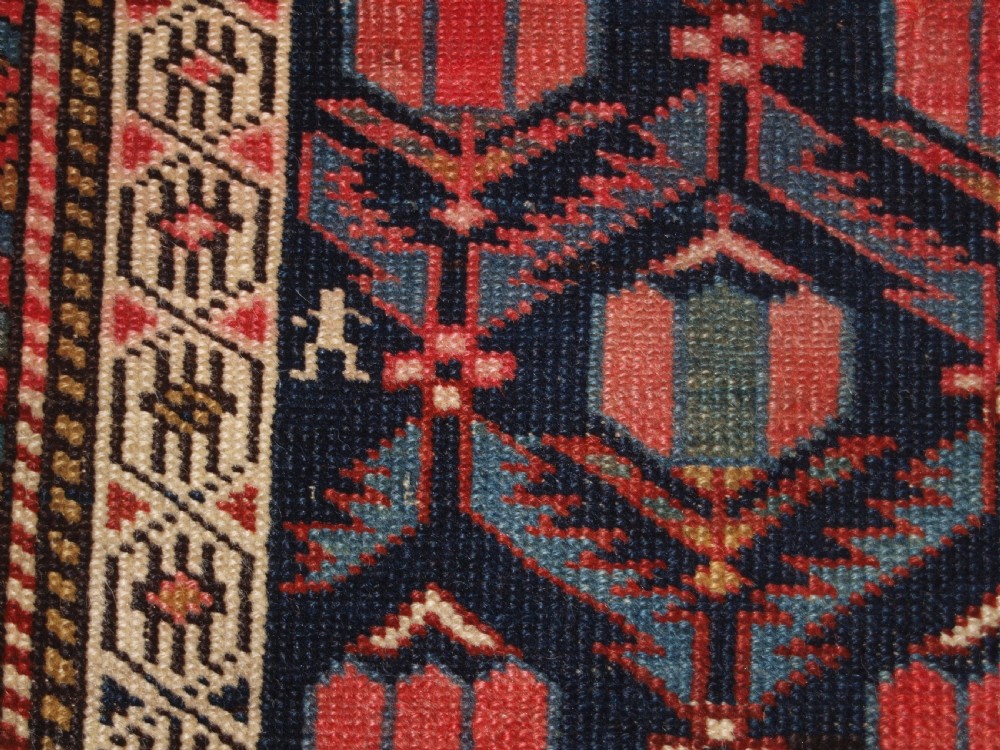 ANTIQUE CAUCASIAN SHIRVAN RUG WITH LATTICE DESIGN FILLED WITH TULIPS, LATE 19TH CENTURY. View X