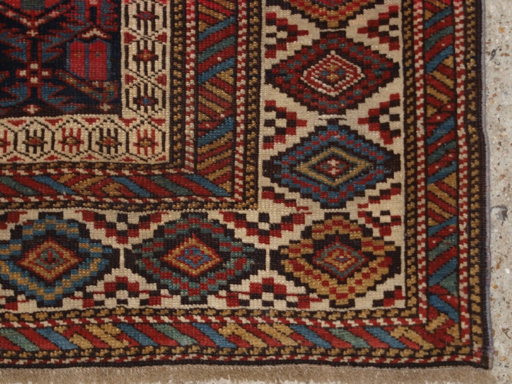 ANTIQUE CAUCASIAN SHIRVAN RUG WITH LATTICE DESIGN FILLED WITH TULIPS, LATE 19TH CENTURY. View XI