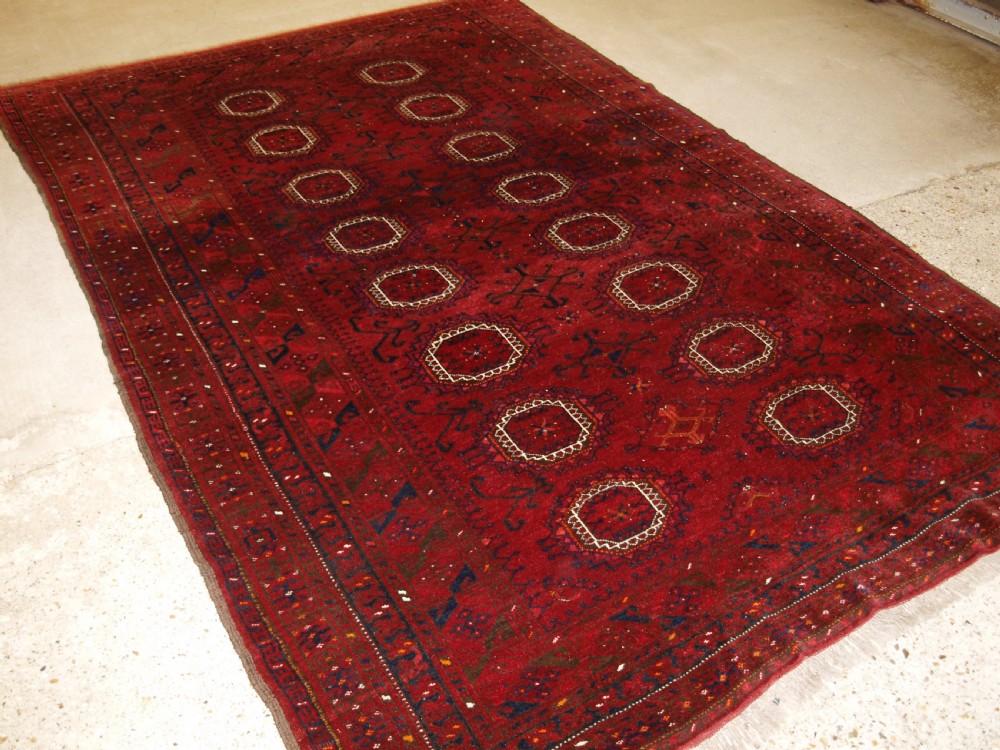 OLD AFGHAN VILLAGE CARPET, TRADITIONAL SALOR GUL DESIGN, HARD WEARING, CIRCA 1920.