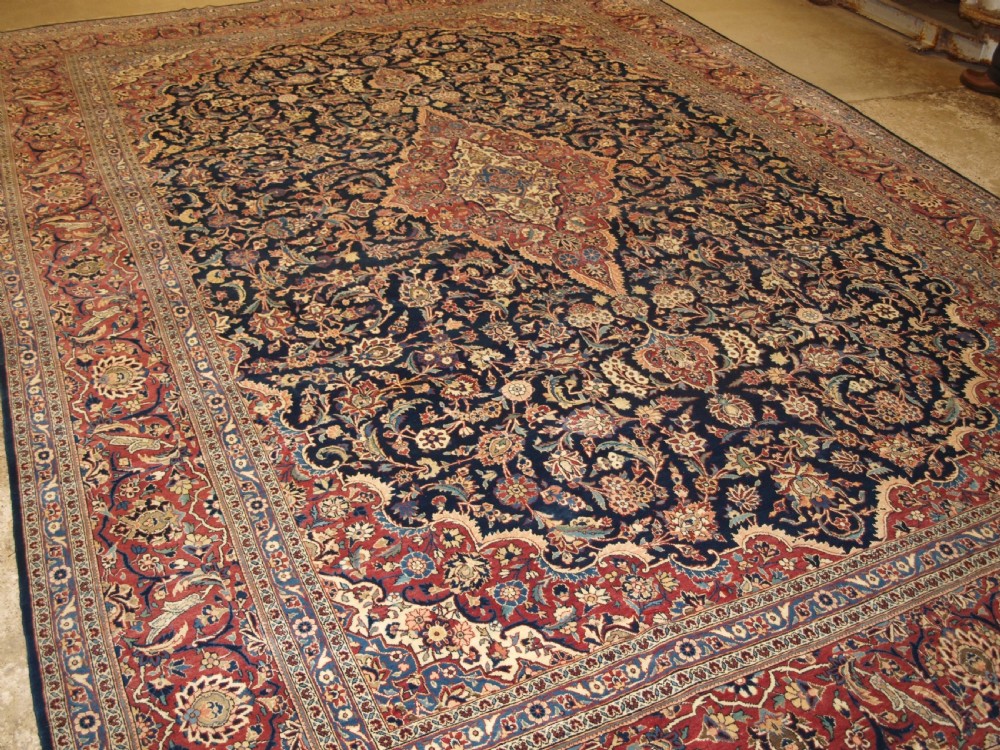 ANTIQUE CARPET OF CLASSIC MEDALLION DESIGN, CIRCA 1900/20. View II