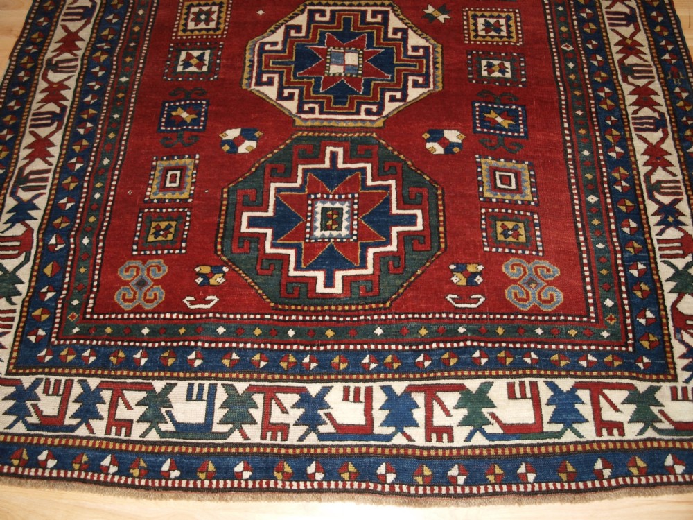 ANTIQUE CAUCASIAN KAZAK RUG WITH MEMLINC GULS, SUPERB BORDER, LATE 19TH CENTURY. View VI