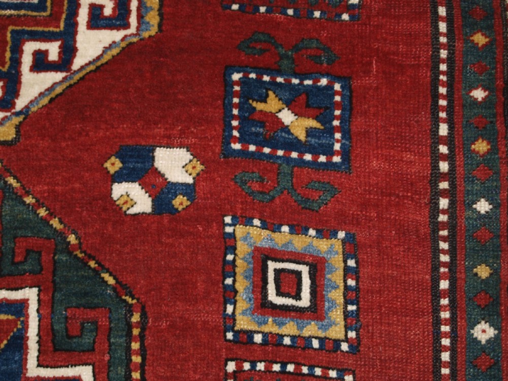 ANTIQUE CAUCASIAN KAZAK RUG WITH MEMLINC GULS, SUPERB BORDER, LATE 19TH CENTURY. View X