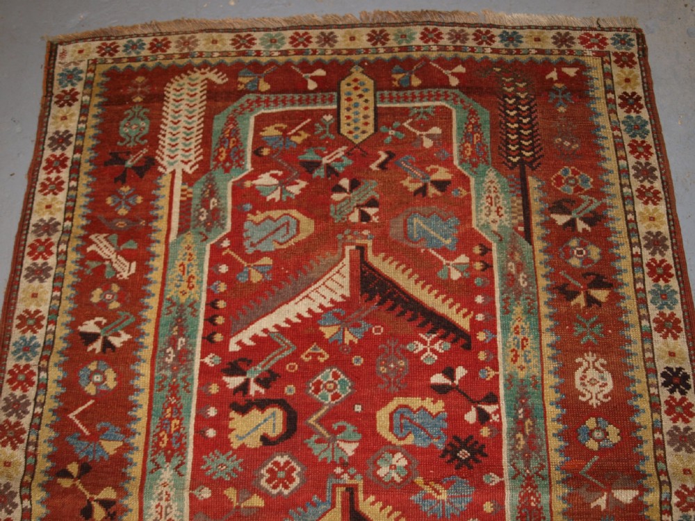 ANTIQUE TURKISH MILAS PRAYER RUG, WONDERFUL EARLY EXAMPLE, 2ND HALF 19TH CENTURY. View IV