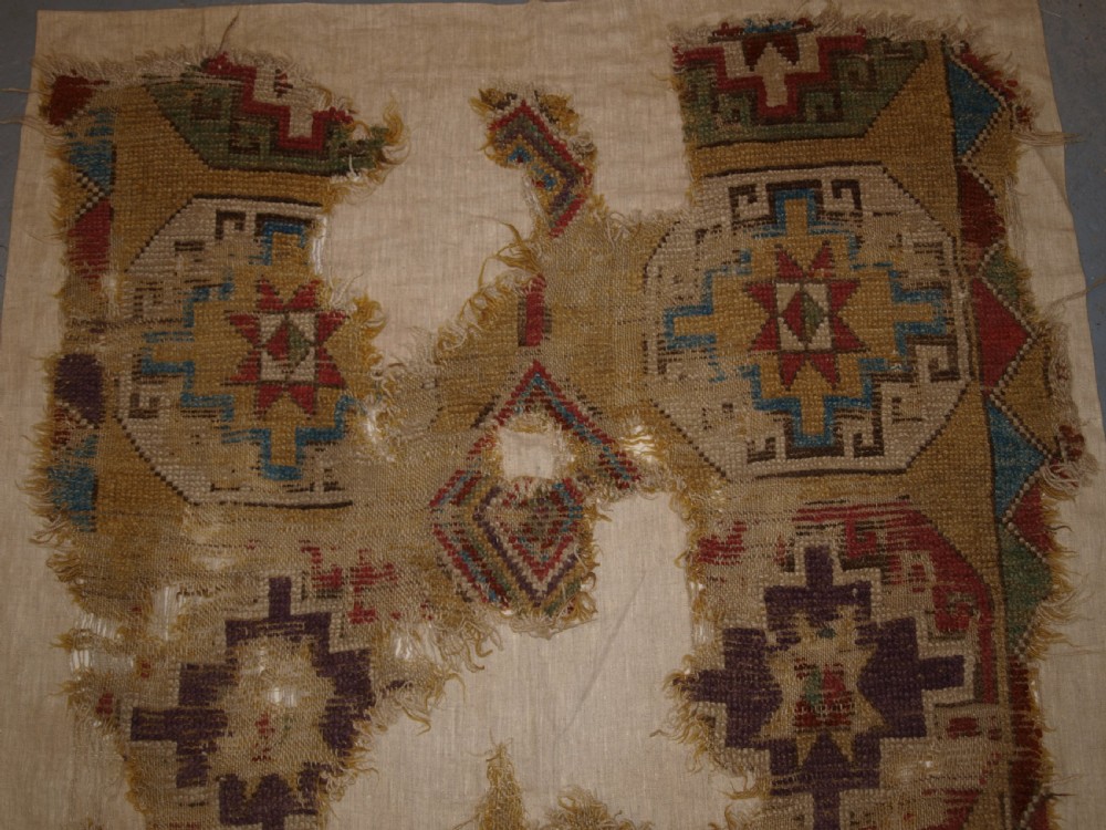 ANTIQUE MOUNTED FRAGMENT OF TURKISH KONYA LONG RUG WITH MEMLINC GULS, 1ST HALF 18TH CENTURY. View III