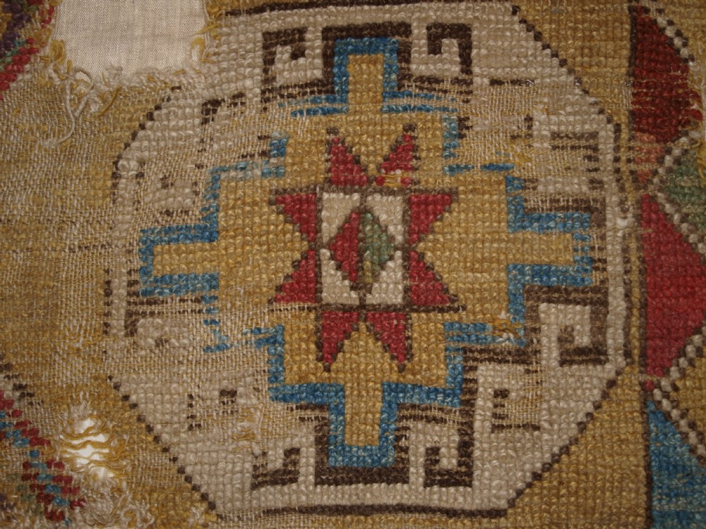 ANTIQUE MOUNTED FRAGMENT OF TURKISH KONYA LONG RUG WITH MEMLINC GULS, 1ST HALF 18TH CENTURY. View VI