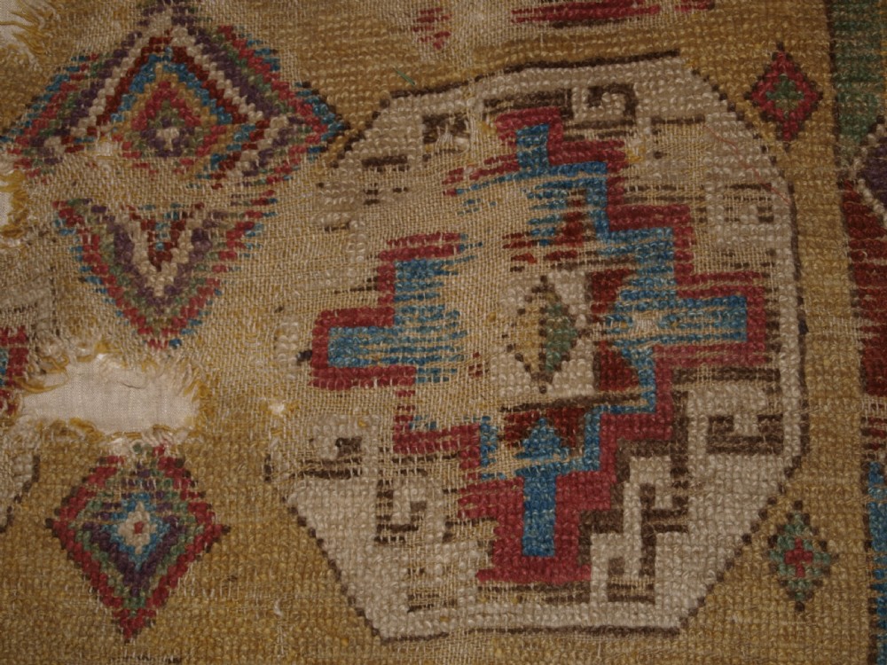 ANTIQUE MOUNTED FRAGMENT OF TURKISH KONYA LONG RUG WITH MEMLINC GULS, 1ST HALF 18TH CENTURY. View VII