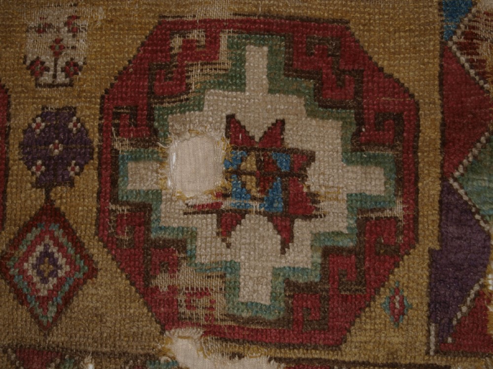 ANTIQUE MOUNTED FRAGMENT OF TURKISH KONYA LONG RUG WITH MEMLINC GULS, 1ST HALF 18TH CENTURY. View VIII