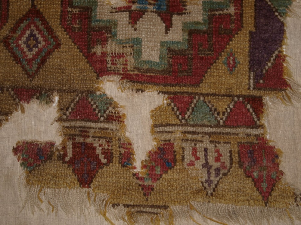 ANTIQUE MOUNTED FRAGMENT OF TURKISH KONYA LONG RUG WITH MEMLINC GULS, 1ST HALF 18TH CENTURY. View IX