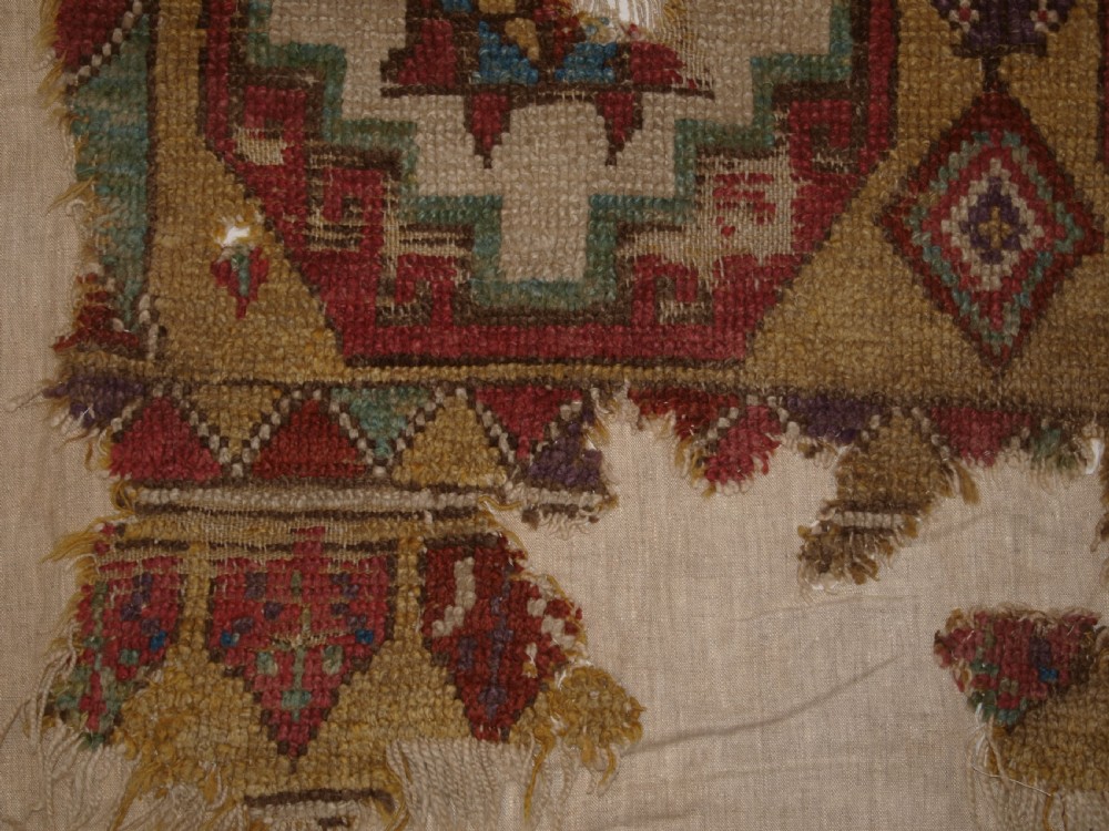 ANTIQUE MOUNTED FRAGMENT OF TURKISH KONYA LONG RUG WITH MEMLINC GULS, 1ST HALF 18TH CENTURY. View XI