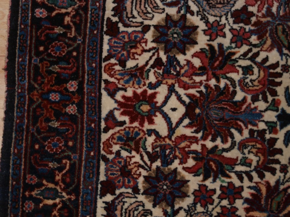 OLD PERSIAN BIJAR RUG, IVORY GROUND WITH FLORAL DESIGN, CIRCA 1920/30. View III