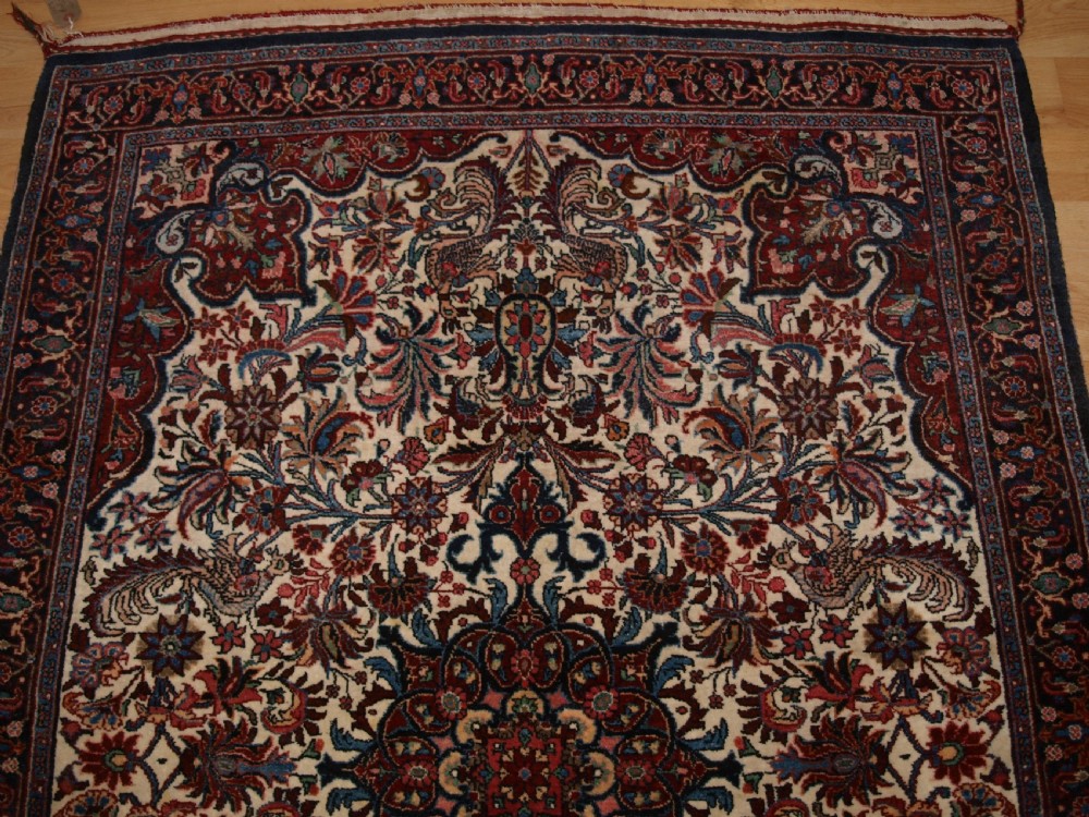 OLD PERSIAN BIJAR RUG, IVORY GROUND WITH FLORAL DESIGN, CIRCA 1920/30. View IV