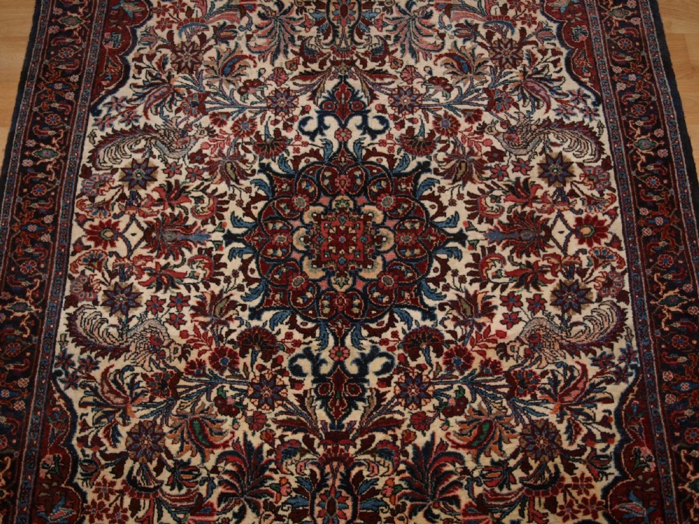 OLD PERSIAN BIJAR RUG, IVORY GROUND WITH FLORAL DESIGN, CIRCA 1920/30. View V