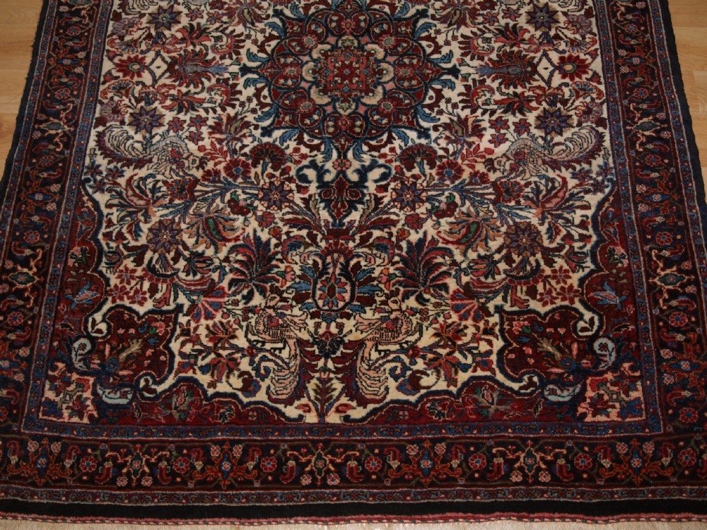 OLD PERSIAN BIJAR RUG, IVORY GROUND WITH FLORAL DESIGN, CIRCA 1920/30. View VI