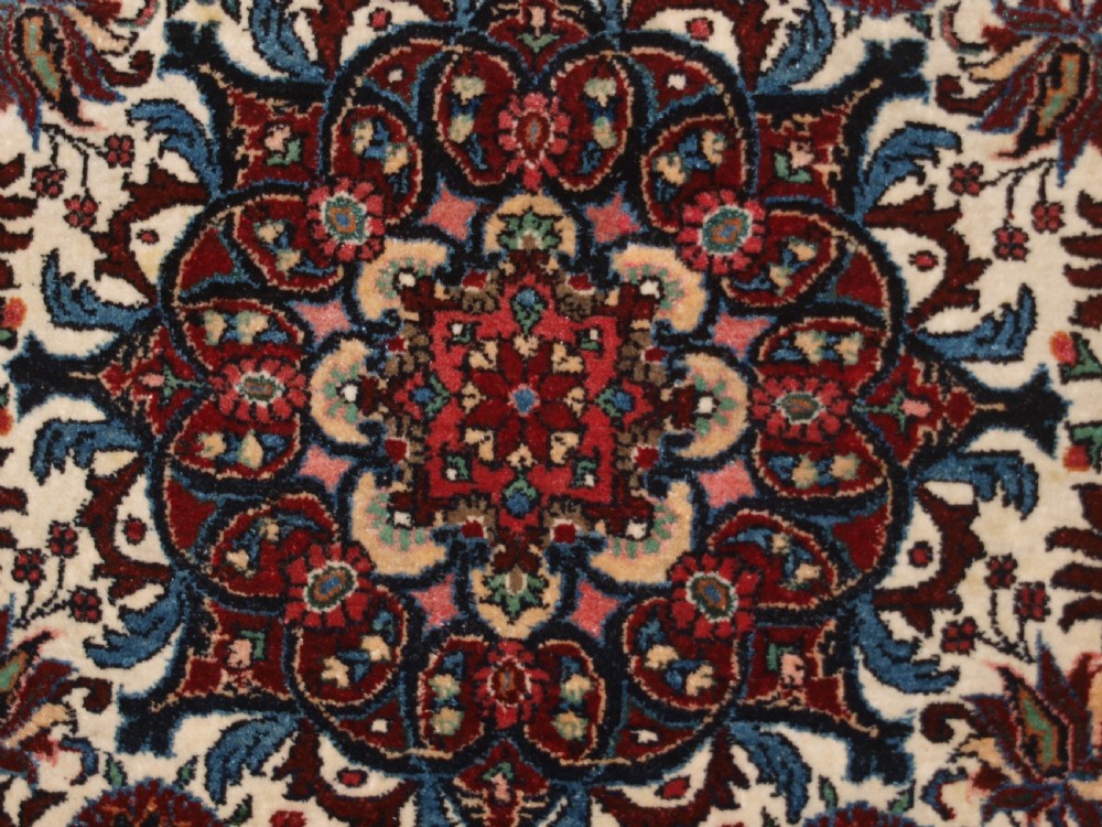 OLD PERSIAN BIJAR RUG, IVORY GROUND WITH FLORAL DESIGN, CIRCA 1920/30. View VIII