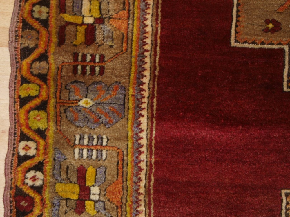 ANTIQUE TURKISH MADEN REGION RUG, DOUBLE MEDALLION, RED GROUND, CIRCA 1900. View III
