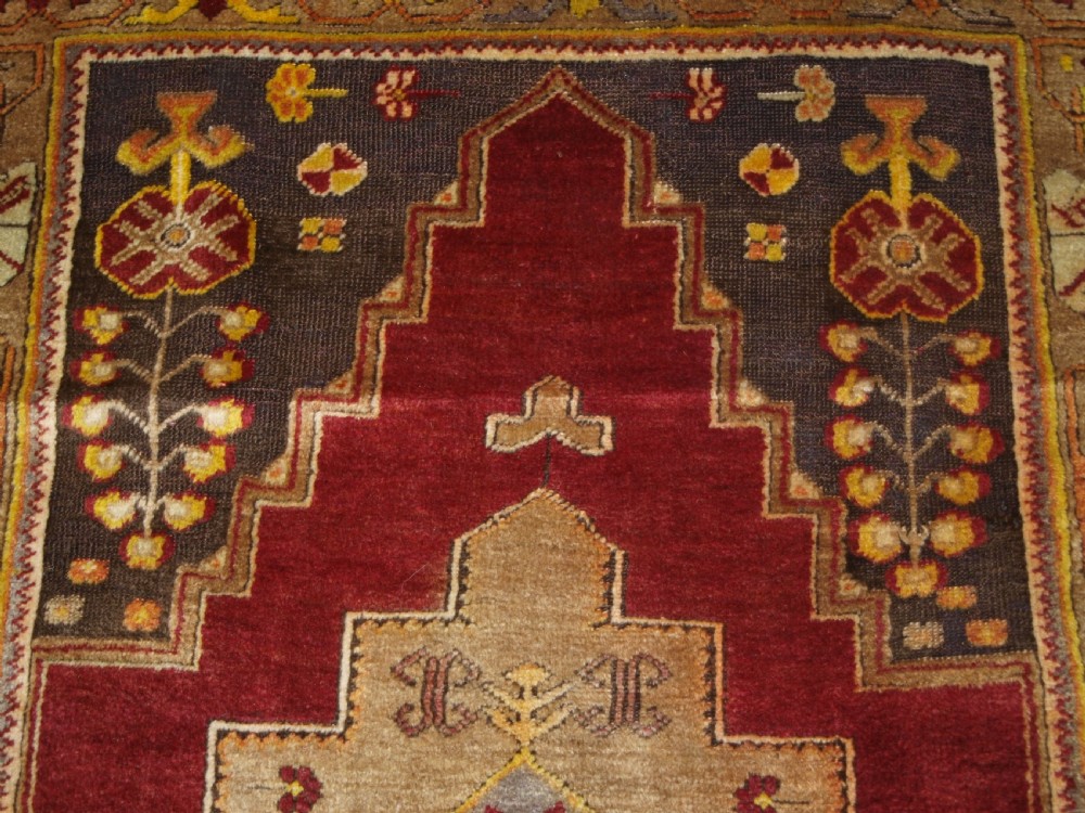 ANTIQUE TURKISH MADEN REGION RUG, DOUBLE MEDALLION, RED GROUND, CIRCA 1900. View VII