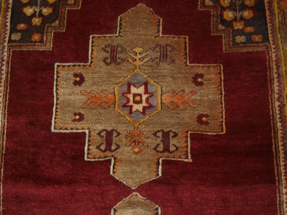 ANTIQUE TURKISH MADEN REGION RUG, DOUBLE MEDALLION, RED GROUND, CIRCA 1900. View VIII