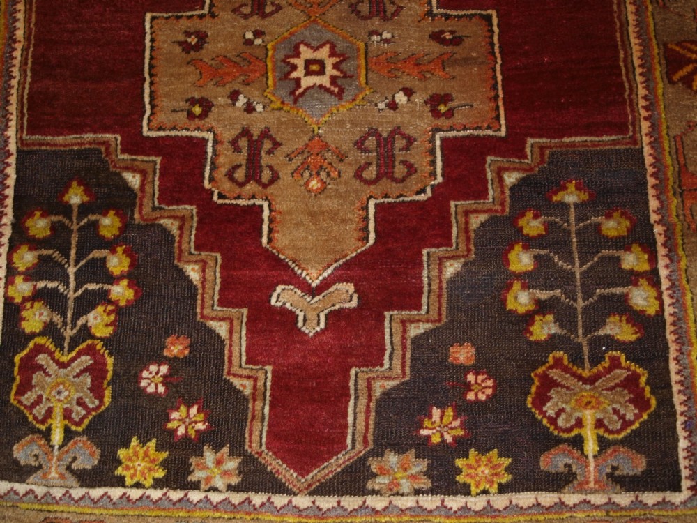 ANTIQUE TURKISH MADEN REGION RUG, DOUBLE MEDALLION, RED GROUND, CIRCA 1900. View IX