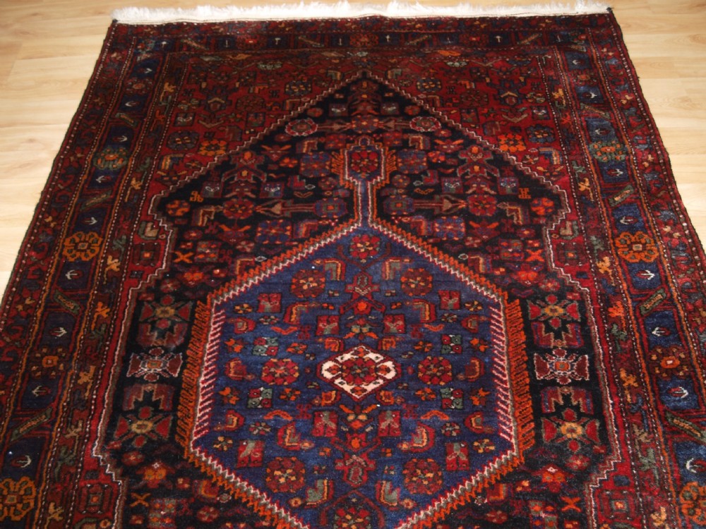 ANTIQUE NORTH WEST PERSIAN VILLAGE RUG, HAMADAN REGION, CIRCA 1920. View IV
