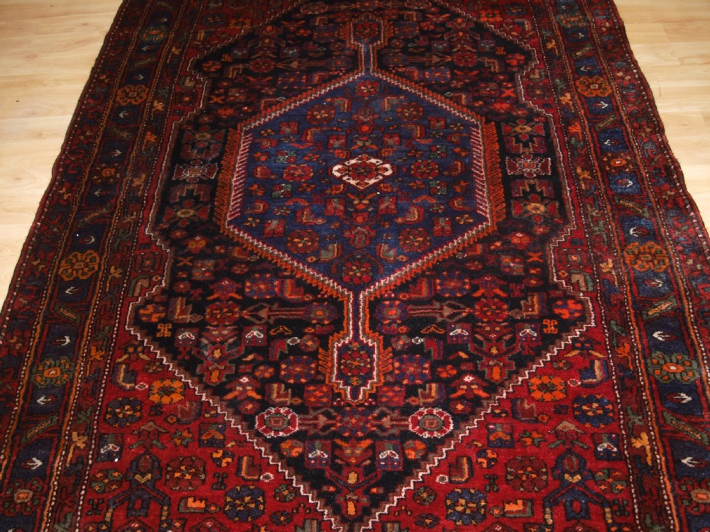 ANTIQUE NORTH WEST PERSIAN VILLAGE RUG, HAMADAN REGION, CIRCA 1920. View V