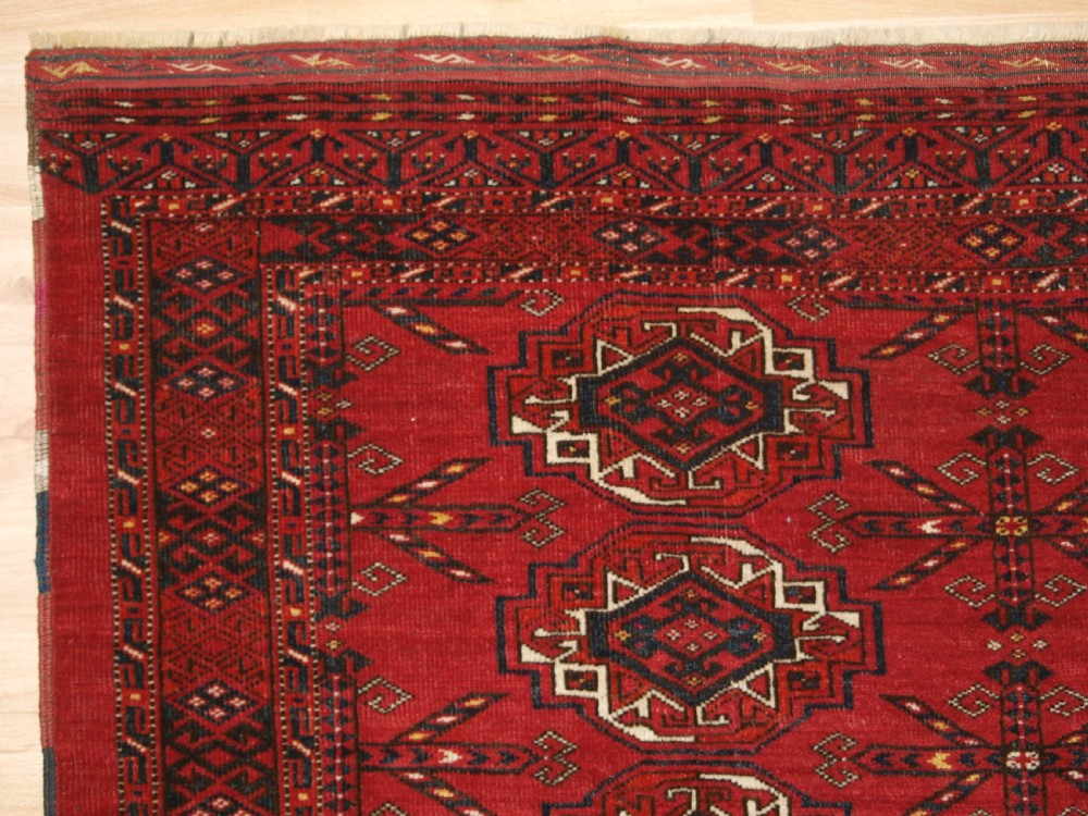 ANTIQUE KIZIL AYAK ERSARI TURKMEN 12 GUL CHUVAL, CIRCA 1900. View II