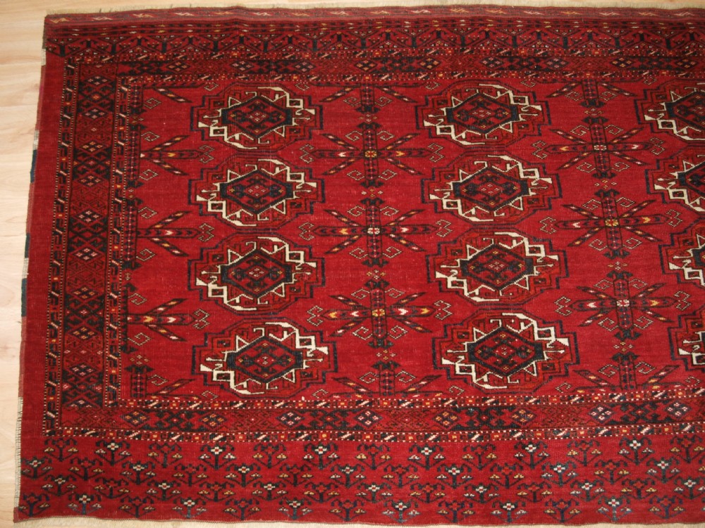 ANTIQUE KIZIL AYAK ERSARI TURKMEN 12 GUL CHUVAL, CIRCA 1900. View IV