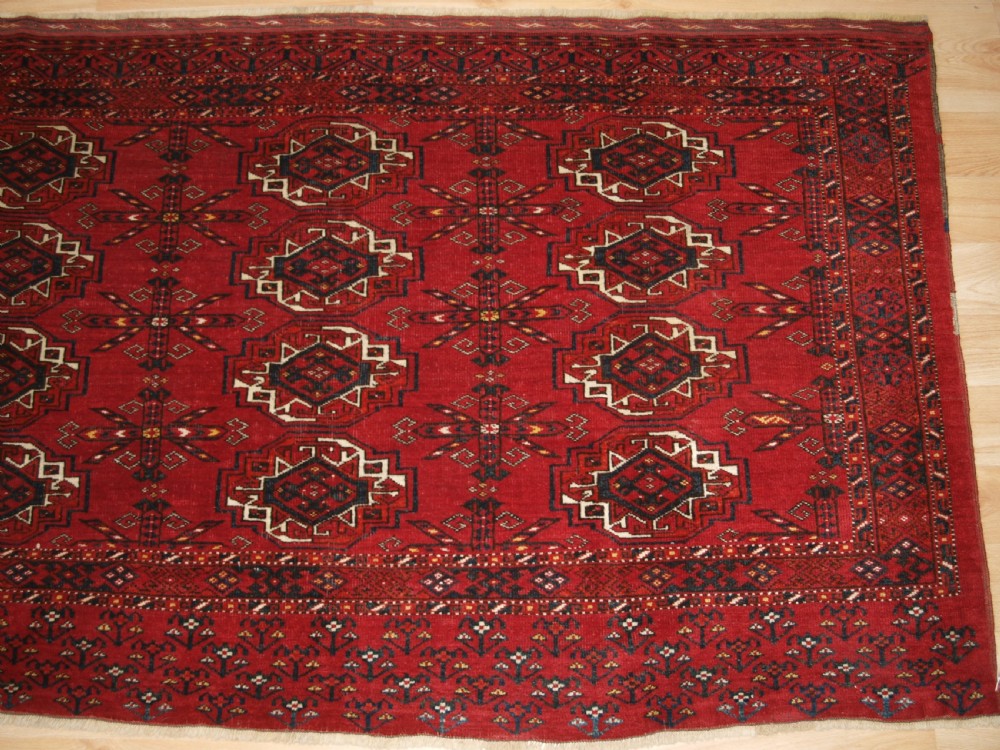 ANTIQUE KIZIL AYAK ERSARI TURKMEN 12 GUL CHUVAL, CIRCA 1900. View V