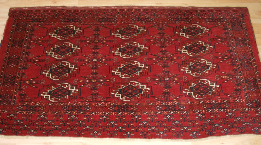 ANTIQUE KIZIL AYAK ERSARI TURKMEN 12 GUL CHUVAL, CIRCA 1900. View VI