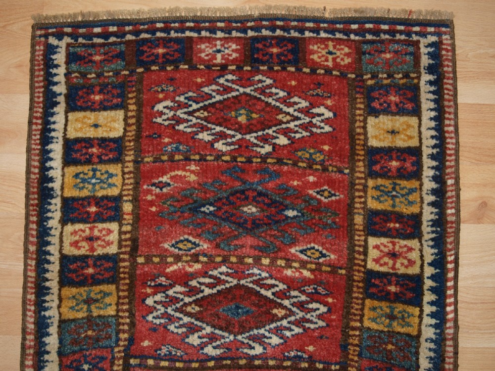 ANTIQUE KURDISH YASTIK, EXCELLENT COLOUR, CIRCA 1900. View II
