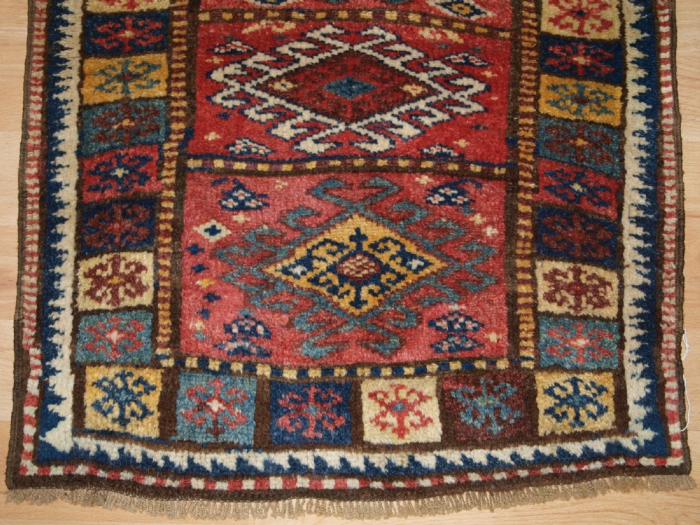ANTIQUE KURDISH YASTIK, EXCELLENT COLOUR, CIRCA 1900. View IV