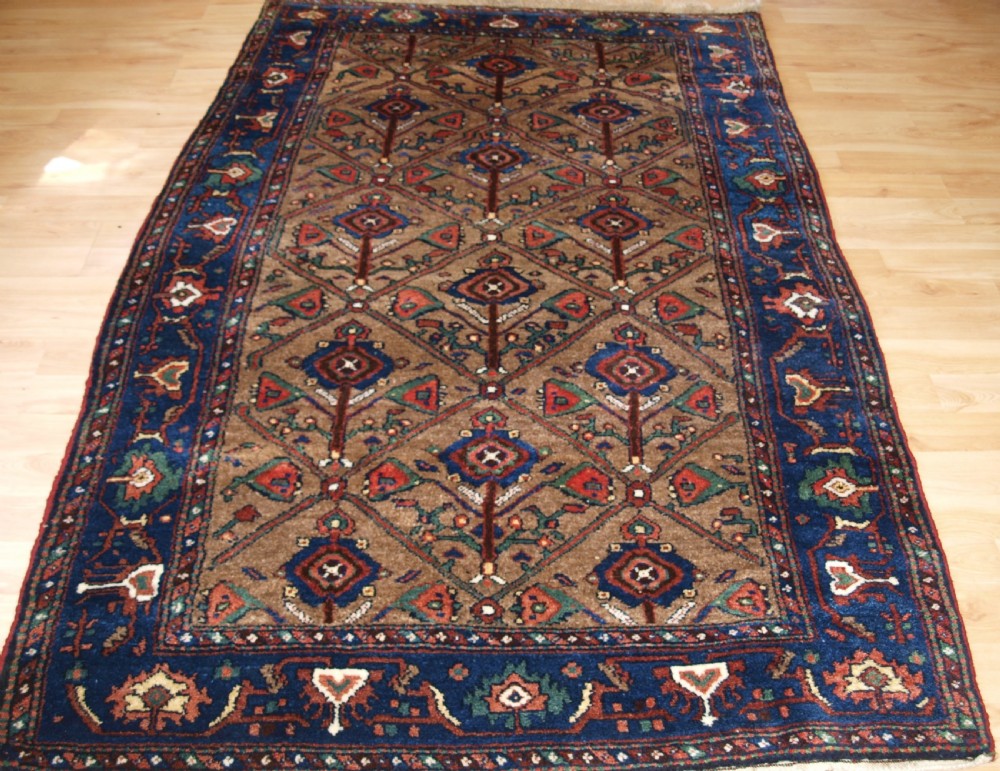 ANTIQUE KURDISH HAMADAN REGION VILLAGE RUG, CIRCA 1900/20.
