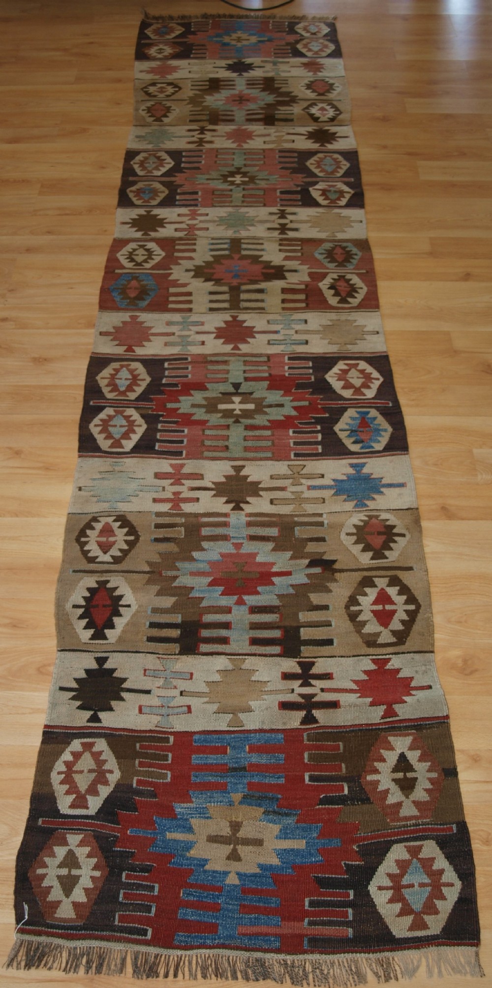OLD TURKISH KILIM RUNNER WITH GEOMETRIC DESIGN, GOOD COLOURS, CIRCA 1920.