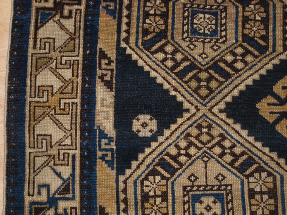ANTIQUE CAUCASIAN SHIRVAN RUG WITH SOFT FADED COLOURS, CIRCA 1900. View IV