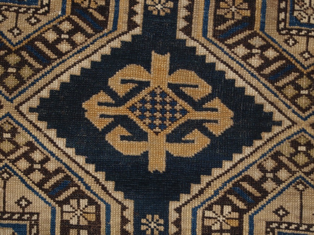 ANTIQUE CAUCASIAN SHIRVAN RUG WITH SOFT FADED COLOURS, CIRCA 1900. View VII