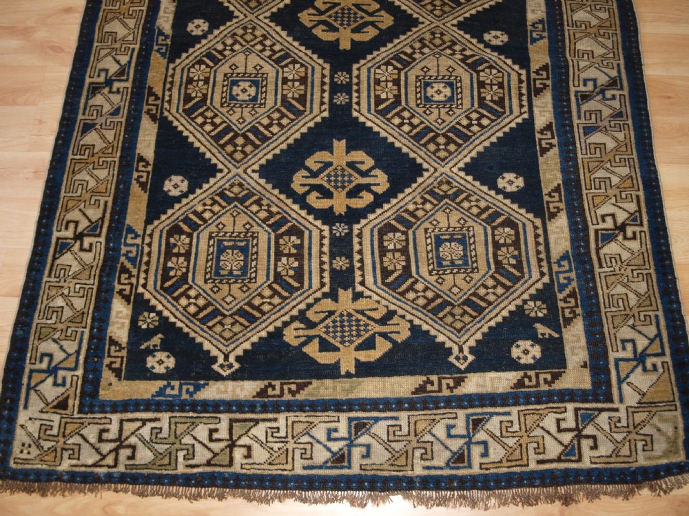 ANTIQUE CAUCASIAN SHIRVAN RUG WITH SOFT FADED COLOURS, CIRCA 1900. View VIII