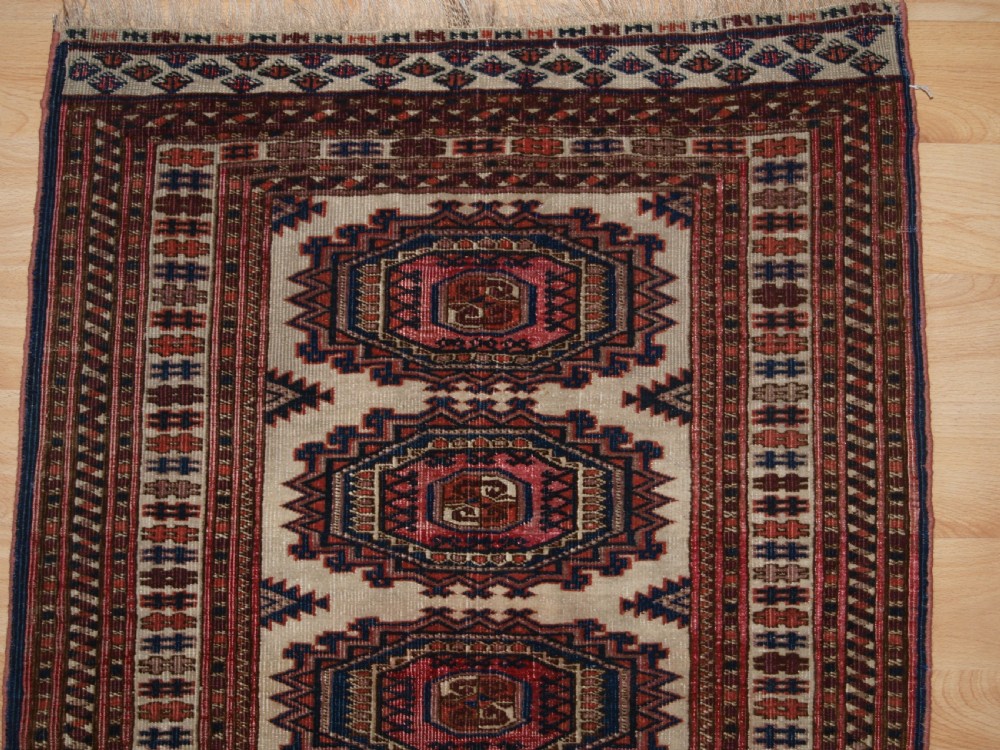 ANTIQUE SARYK TURKMEN RUG OF SMALL SIZE, IVORY GROUND, CIRCA 1900. View III
