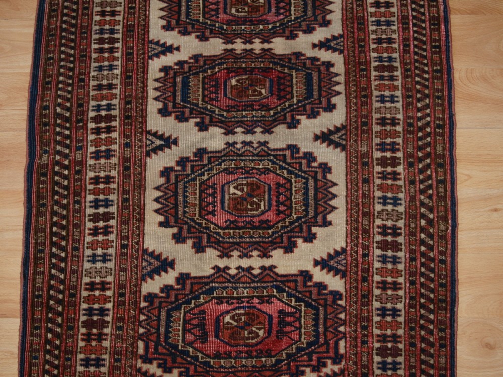 ANTIQUE SARYK TURKMEN RUG OF SMALL SIZE, IVORY GROUND, CIRCA 1900. View V
